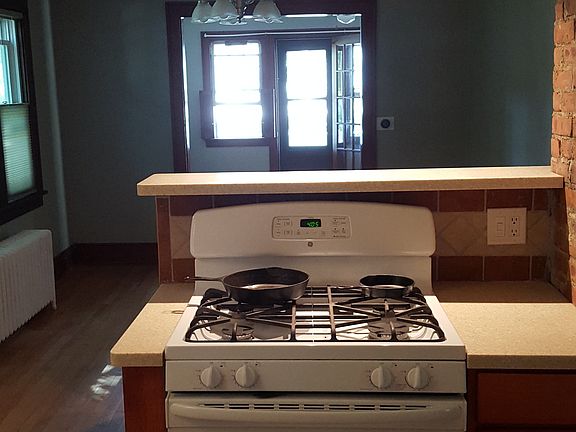 open concept layout from kitchen to front porch