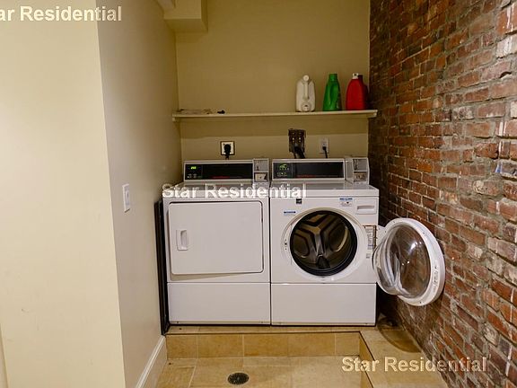 Shared washer and dryer for the building