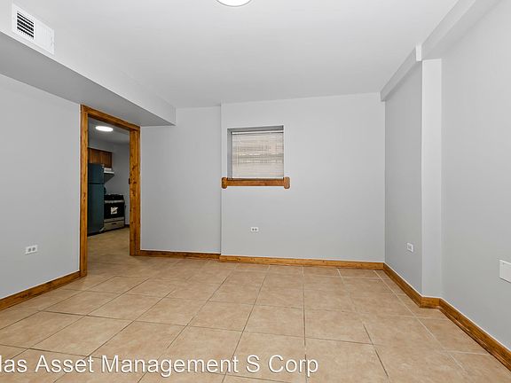 5th image of 6057 S California Ave Basement 6057