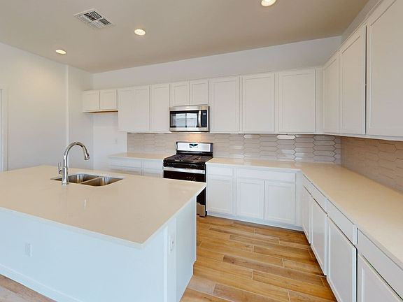 Kitchen in Clover Floor Plan at Highland Sage