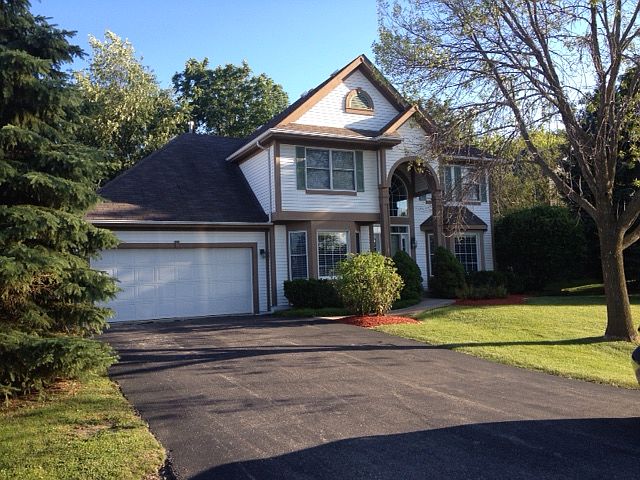 Home front with 2 car garage