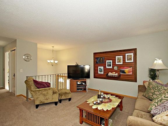 Cozy living room says, 'Welcome Home'.