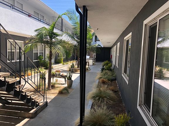 Central Courtyard Area with Communal Dining Area and BarBQ