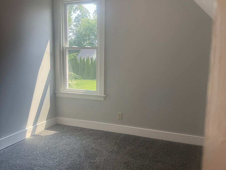 Den. Fresh paint and new carpet throughout.