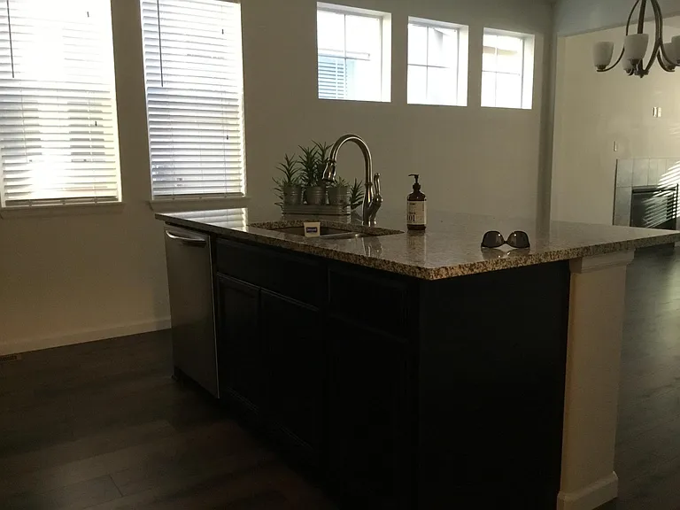 End unit with side windows for natural light. Only one common wall.
