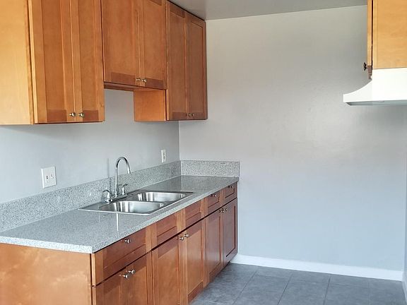 Kitchen with new cabinets, new granite countertop, new sink