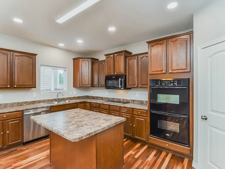 7306 Running Deer Way — Photo 8