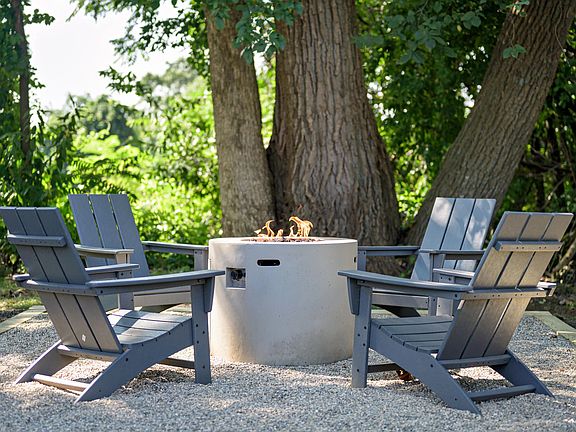 Discover relaxation by our community fire pit, where the glow of the flame adds an extra layer of charm.