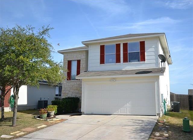 Street view of Front. Beautifully landscaped with stone walkway.