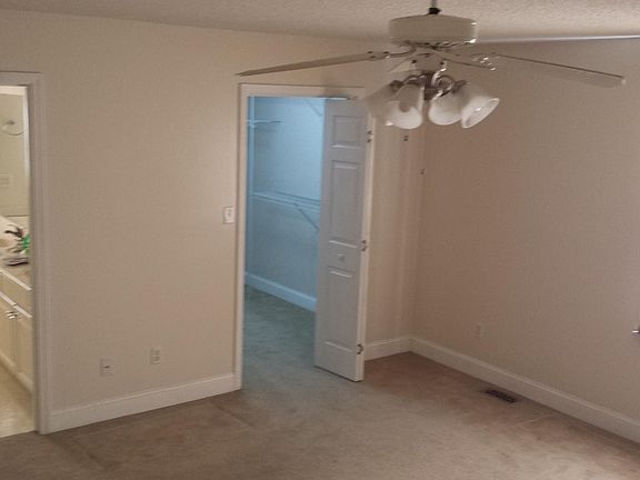 Master bedroom, looking into bathroom and closet.