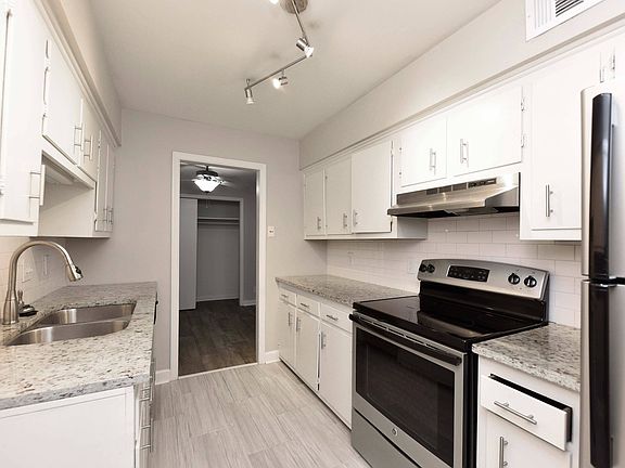Kitchen with Backsplash + Modern Cabinetry