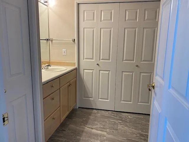 Hall bathroom with laundry