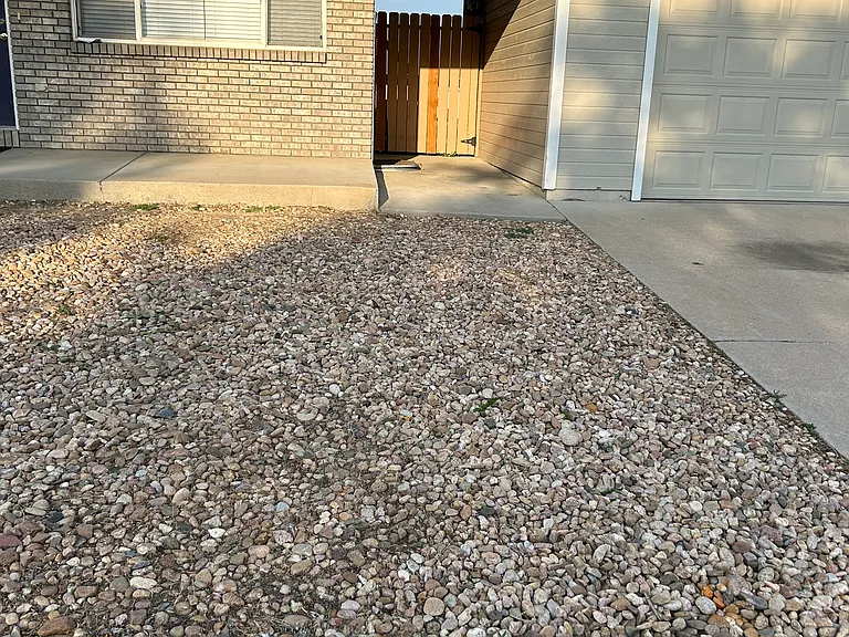 Pathway to backyard and garage