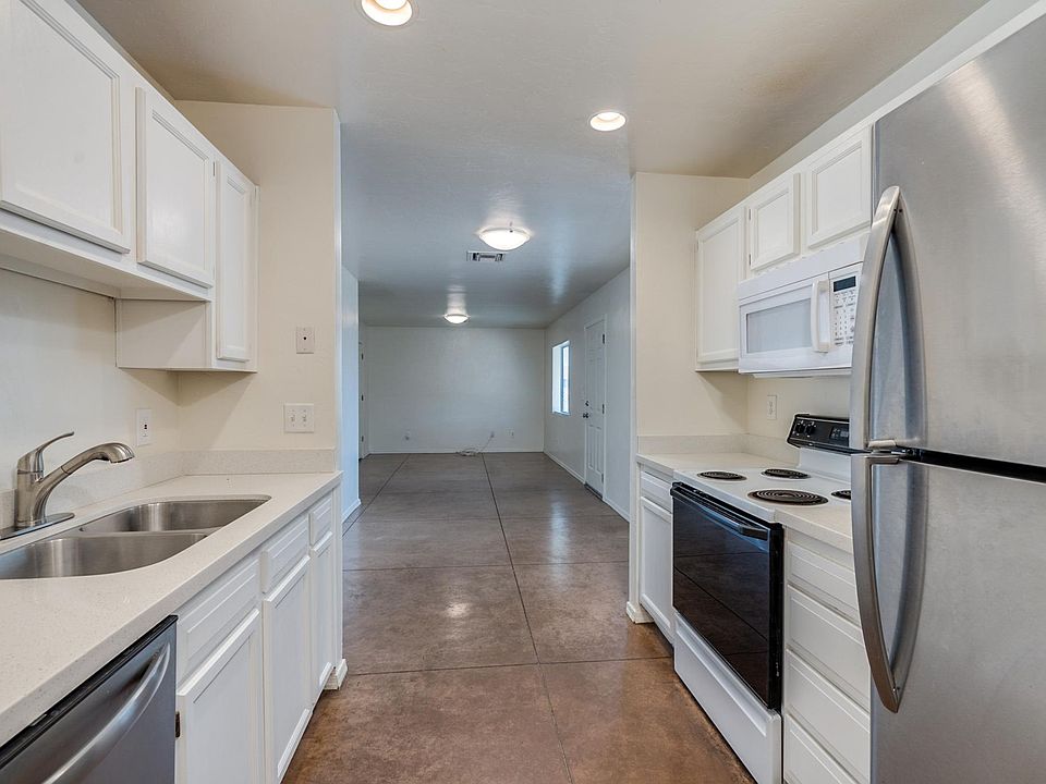 Kitchen with stainless steel appliances.