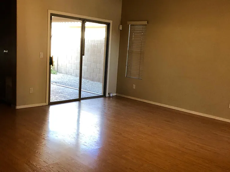 Spacious Living room with views of pool