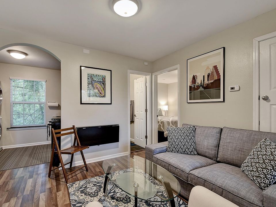 Living room and fold up dining table with two chairs.