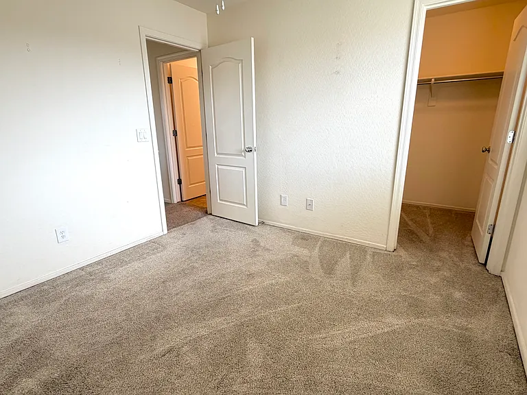 3rd bedroom with walk in closet