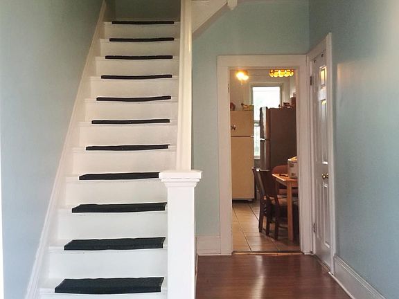 Hallway and stairs to upper floor