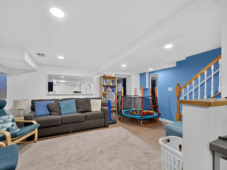 Living room in basement. (Kitchenette not pictured).