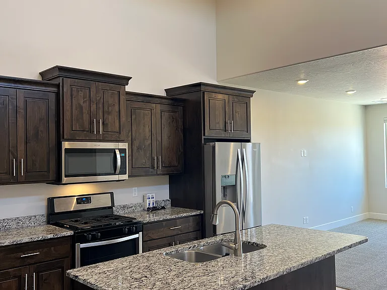 High ceilings in kitchen and dining area.
