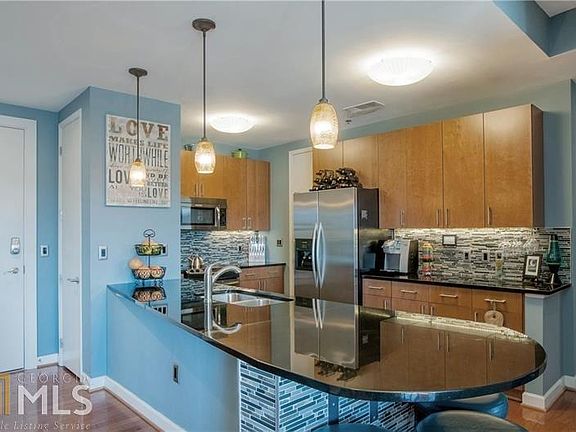 4th image of 711 Cosmopolitan Dr NE Unit 714