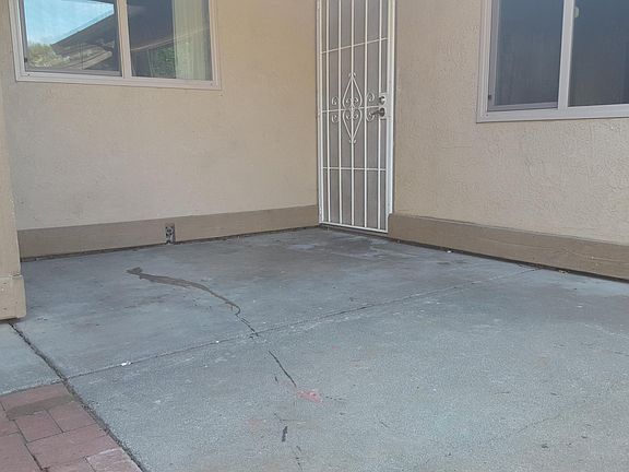 Front patio behind garage