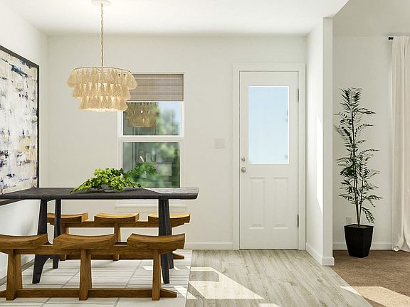The bright eat-in dining room sets the stage for incredible dinner parties or family game night.