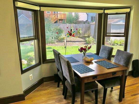 Breakfast nook with bay window. Table expands to seat 8.