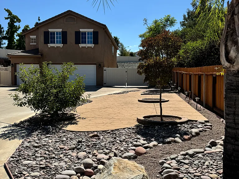 Ample parking in driveway + 3 car garage and fully fenced