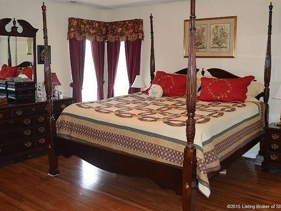 Mater Bedroom located on upper level. Hardwood floors and Tray ceiling