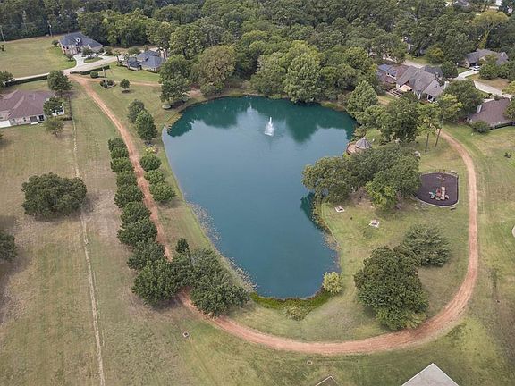 This aerial shows you the full overhead of the Park. If you like to take a walk, this is a great location. So tranquil. There are ducks, fish and turtles in the Pond so bring a loaf of bread when you go to visit them.