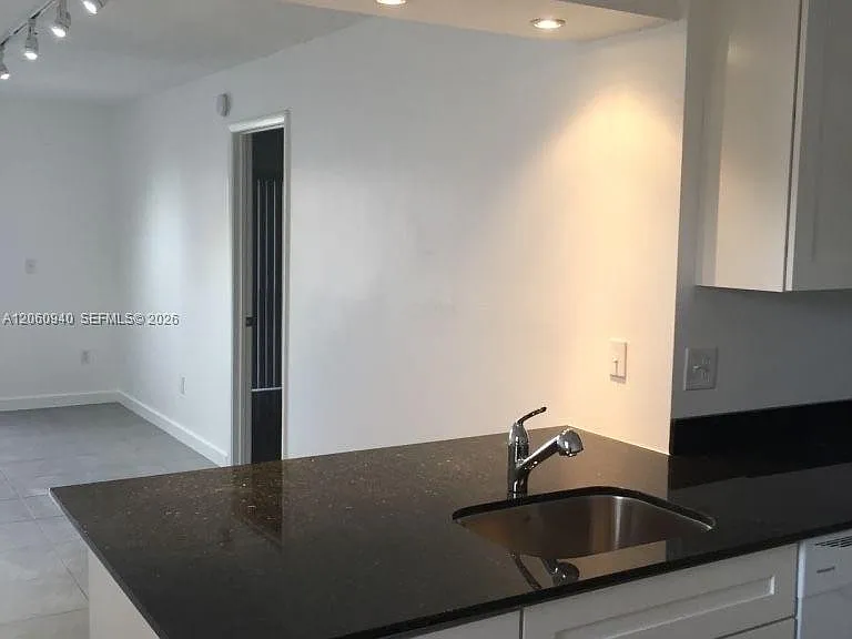 860 NE 209th Ter #104-33 — Photo 1