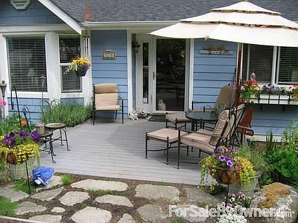 Sunny front deck
						:
						South facing front deck, great for a.m. coffee or evening drinks with neighbors.