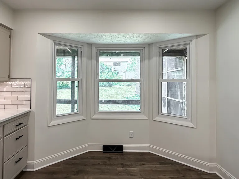 Kitchen Eat In Area, Windows Look Out to Back Yard