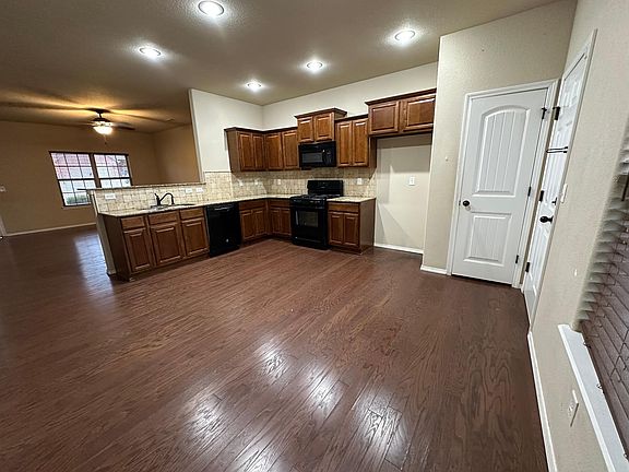 Kitchen with a pantry and gas stove
