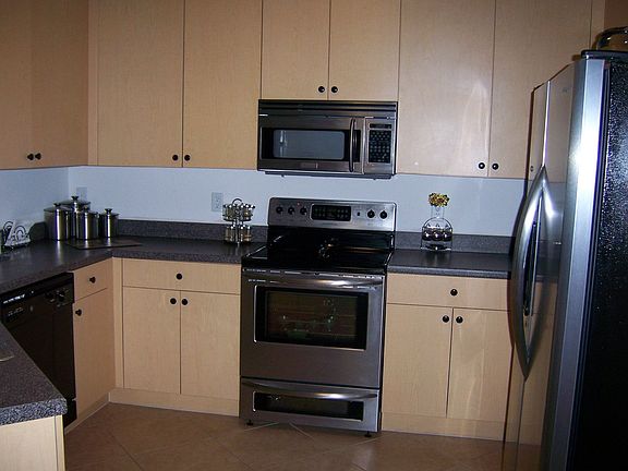 Kitchen w/ stainless steel appliances