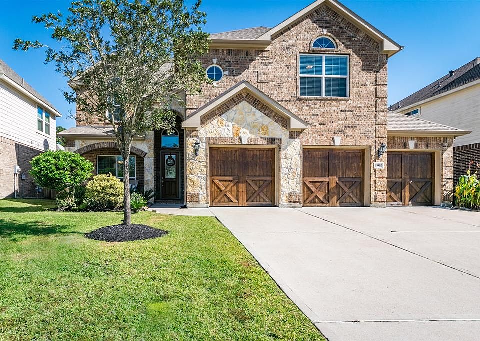 Welcome home to 25402 Lancaster Pine Drive!! This gorgeous home in the Auburn Lakes master planned community.