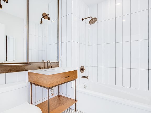 3rd image of 55-27 Myrtle Ave #5O2