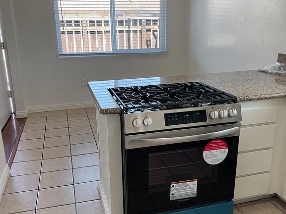 Kitchen open to the dinning area and a new stove/oven