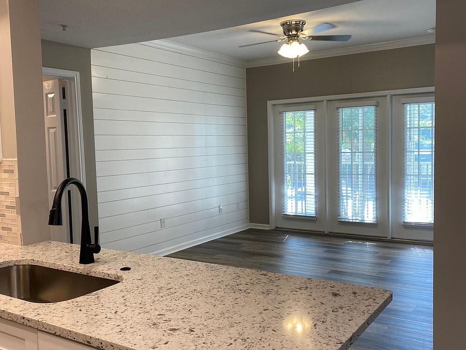 Living Area w/ new flooring and 
Ship-Lap Wall
