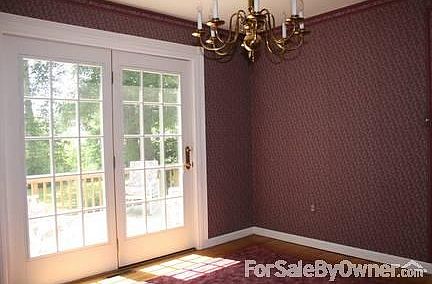 Formal Dining Room has French doors that open to the deck.