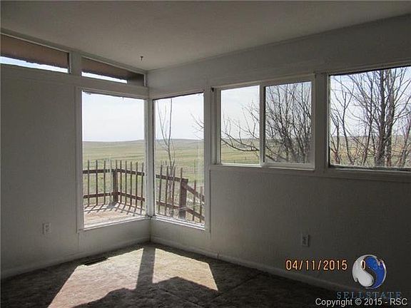 Plenty of ambient light with a prairie view.