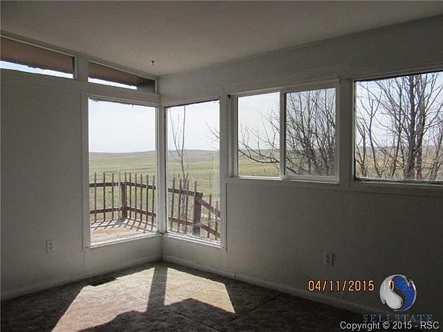 Plenty of ambient light with a prairie view.