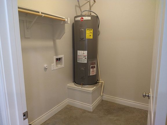 Photo is a similar unit by the same builder from 1000 Wooded Hollow