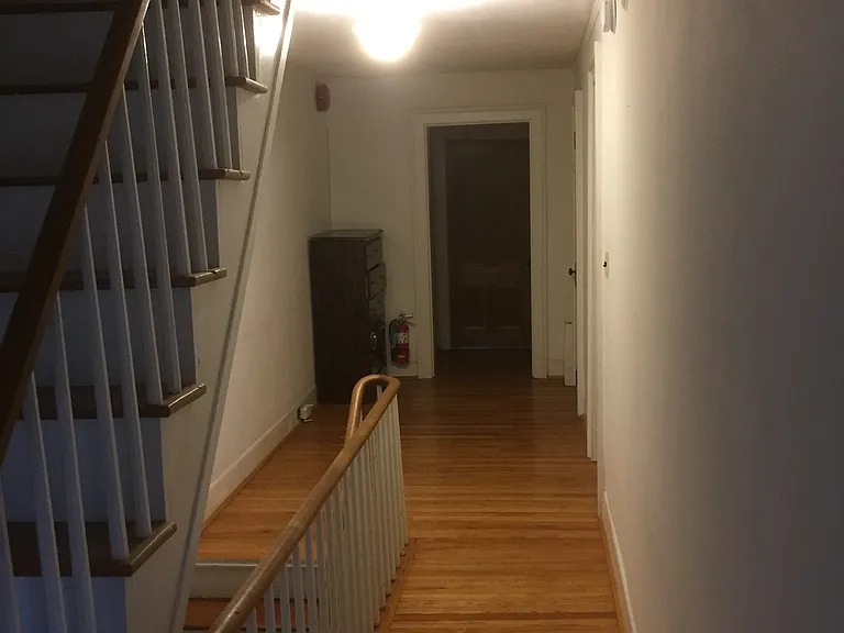Upstairs hallway (showing stairs leading to attic storage
