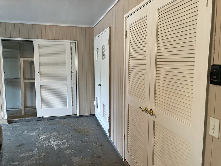 Water heater storage & laundry hookup.
