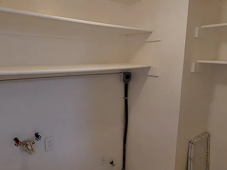 Laundry closet, off kitchen