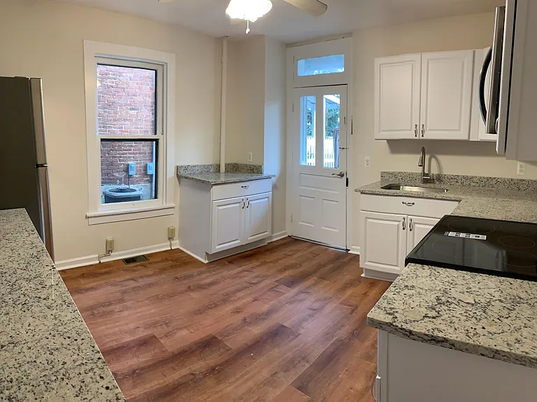219 E 4th St — Photo 15