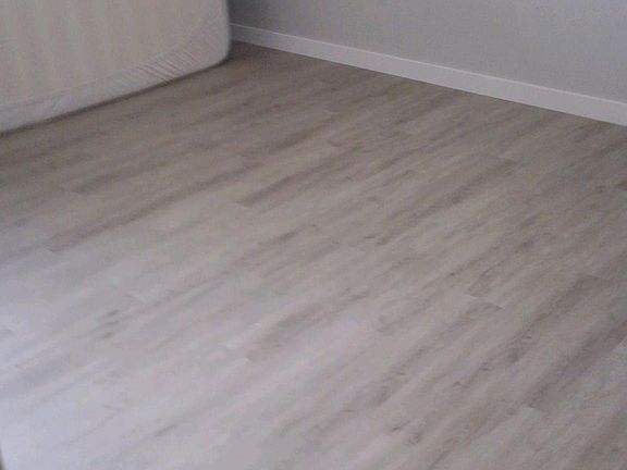 New luxury vinyl floor throughout all bedrooms and upstairs hall, plus new paint and light fixtures. Clean, contemporary look.