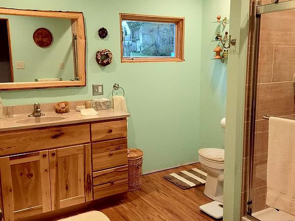 Main bath with hickory cabin